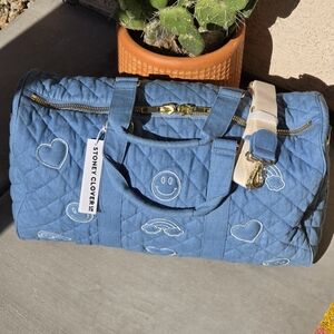 blue jean puffy quilted denim duffle